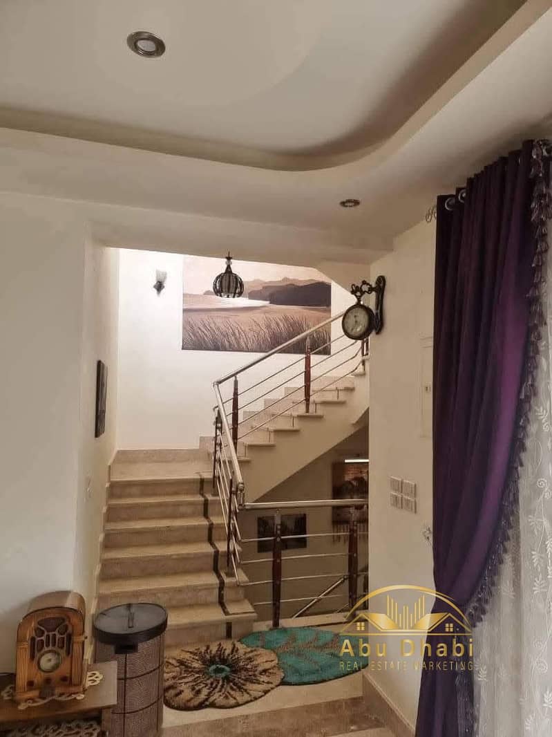 Own a luxurious 1000 sq m (U) villa with a stunning golf course view in Madinaty VG1 - Mehr