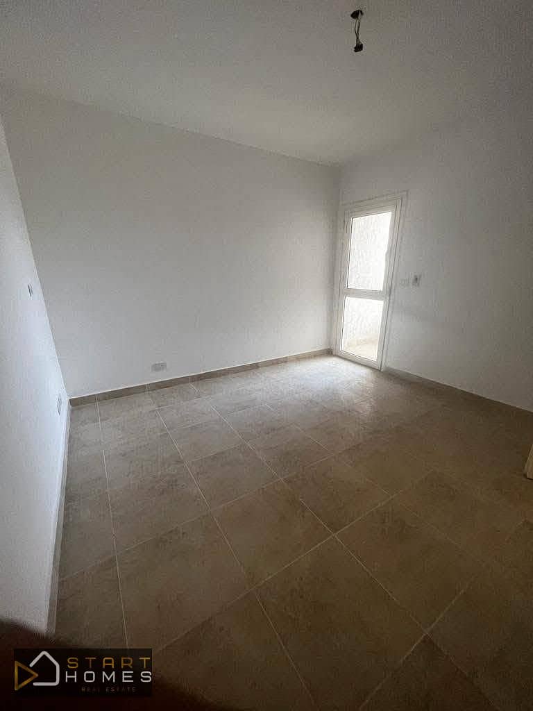 165-square-meter, 3-bedroom apartment for sale in Madinaty’s most prestigious phase, B12. It features a "double view" overlooking the floodway, Season - Vaade 4
