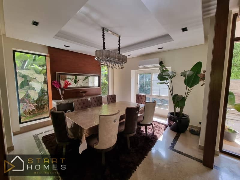 Furnished 5-bedroom villa for rent in Madinaty, featuring a 730-square-meter plot, custom finishes, and a distinctive garden view. - Widok 4