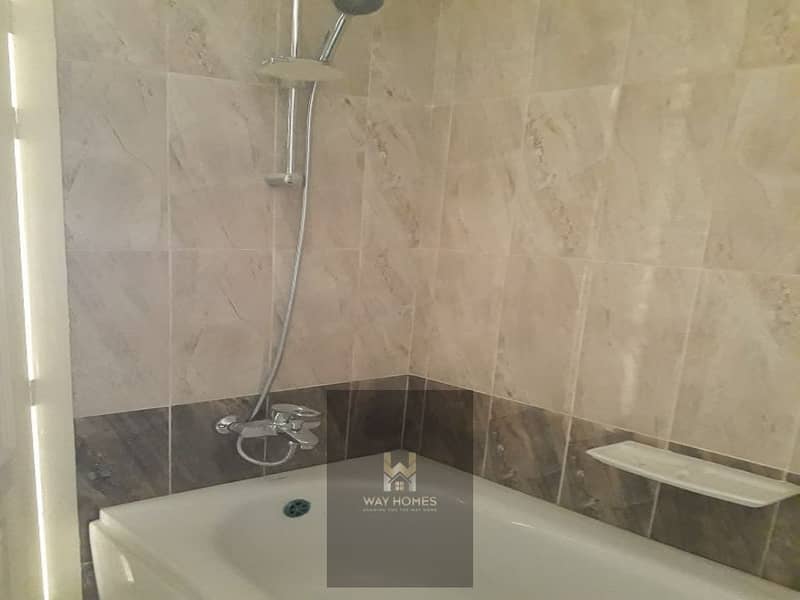 For sale in Madinaty, a ground floor apartment with a garden of 108 sqm and a 55 sqm yard with a down payment and old booking installments in B14 - Widok 5