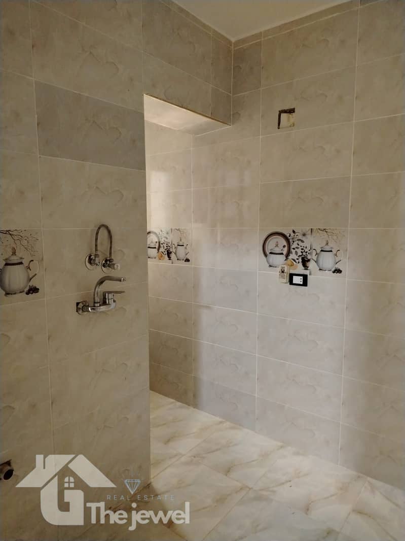 Apartment for rent, residential or administrative, in the First Settlement, Al Yasmin Villas - Vista 5
