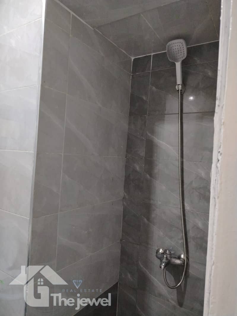 Apartment for rent, residential or administrative, in the First Settlement, Al Yasmin Villas - Vista 6