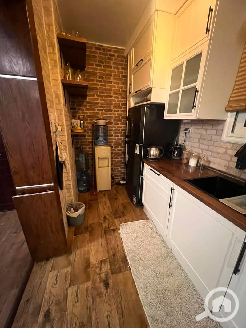Apartment for rent with private garden 70m fully furnished super lux finishing wide garden view first use 131m 3 bedrooms in Al Rehab 2 - Phase 7 - Mehr