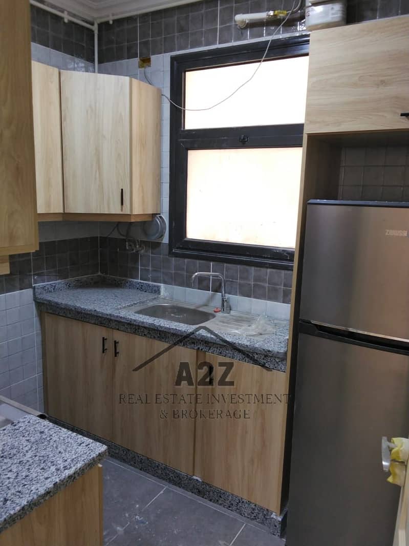 Apartment for rent in the compound of Selya, the administrative capital, with kitchen, heaters, and chandeliers, first residence, ready to move in. - Widok 6