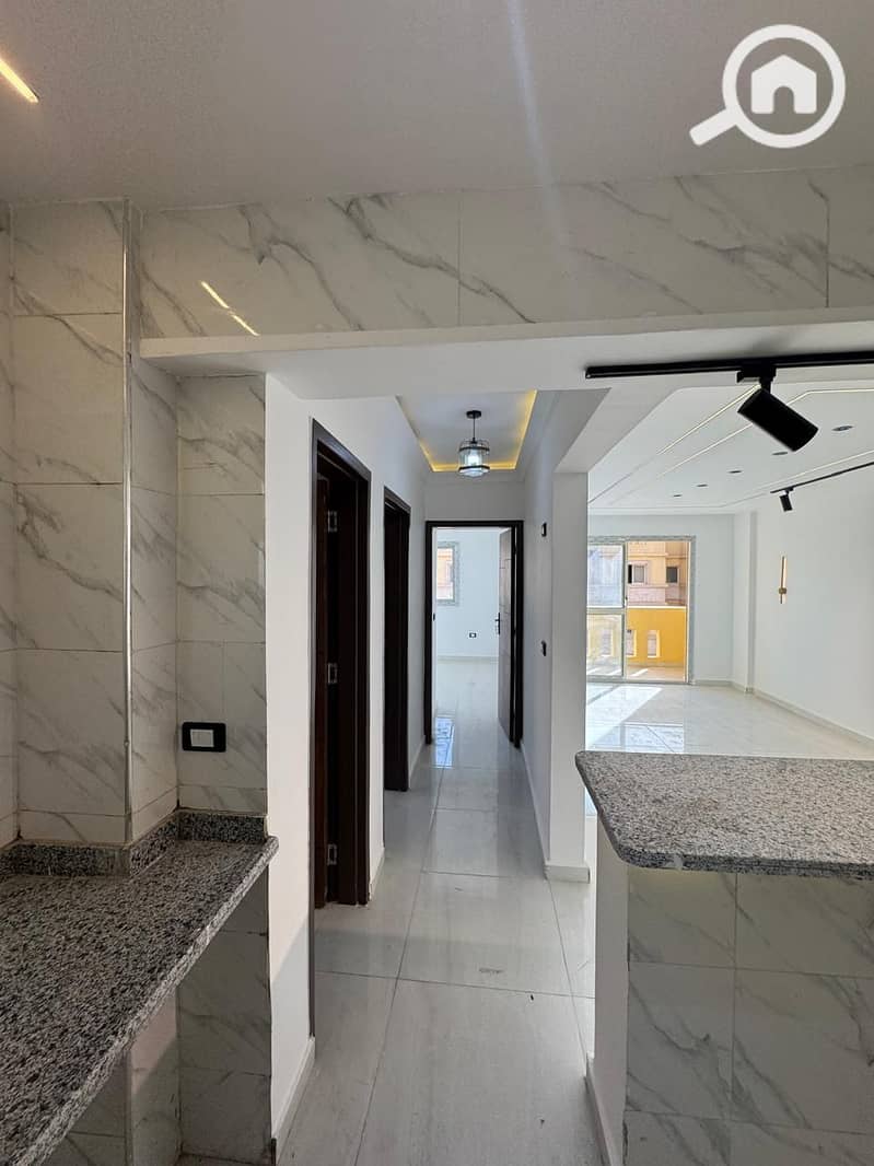 A unique seaside apartment for sale with a special design, delivered by the company with frames, doors, and plastering at a very competitive and special price. - Widok 5