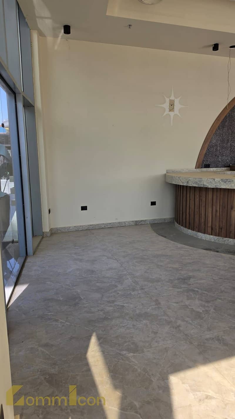 Shop for rent, fully finished, directly on North 90th Street in Fifth Settlement - Widok 6