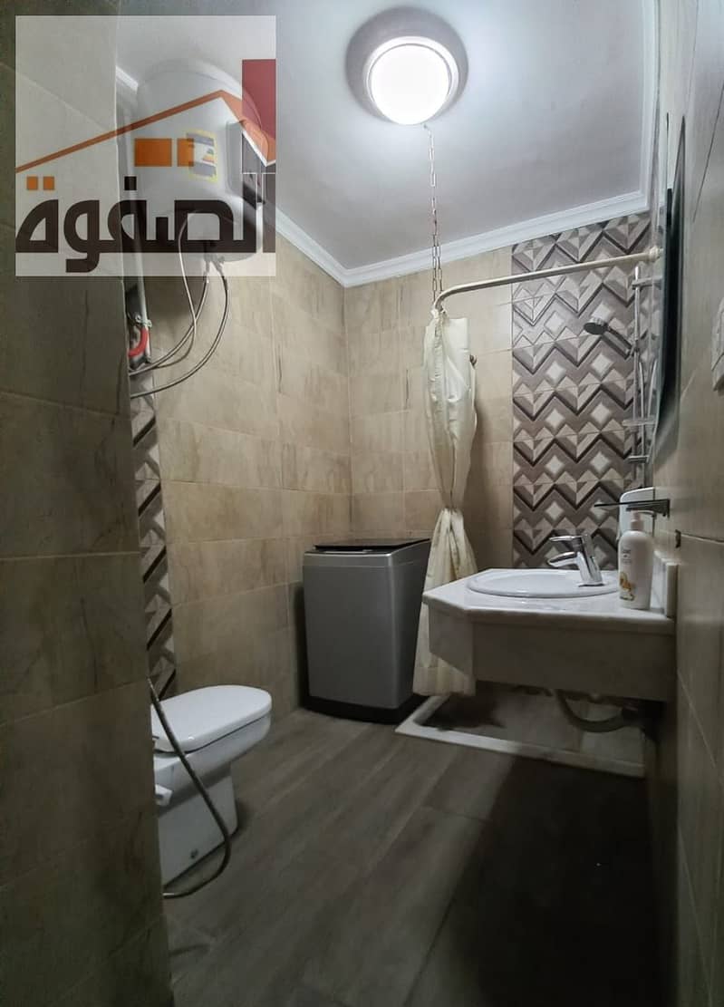 Apartment for rent with kitchen only in Zahra El Maadi, Ashgar Derna compound, distinguished and upscale location on El Saada Street next to Carrefour and all services, restaurants, and international brands. – pohled 4