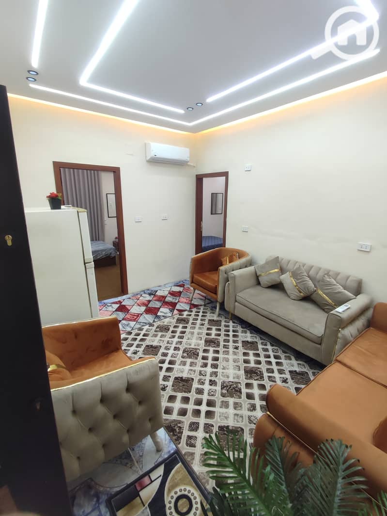 A furnished apartment is available in the main Moneel area, close to Qasr Aini. - Bild 2
