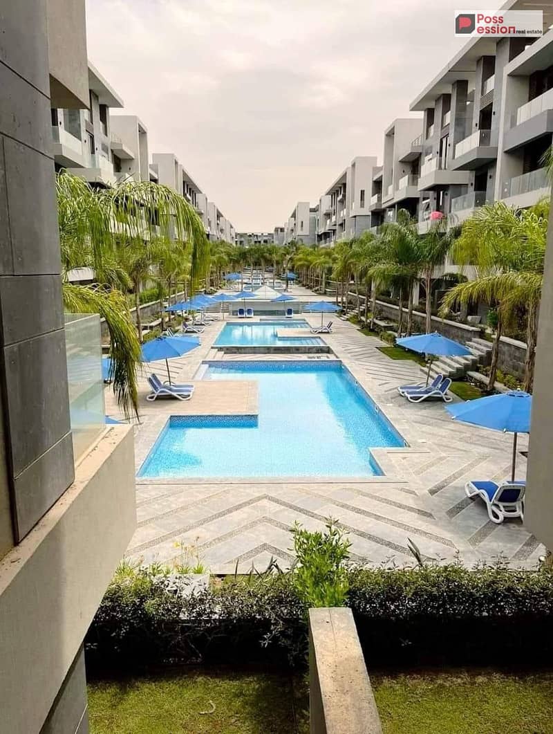 Apartment for sale, 164 sqm, in La Vista Patio Oro compound, featuring an open view overlooking the pools, prime location New Cairo - Altro