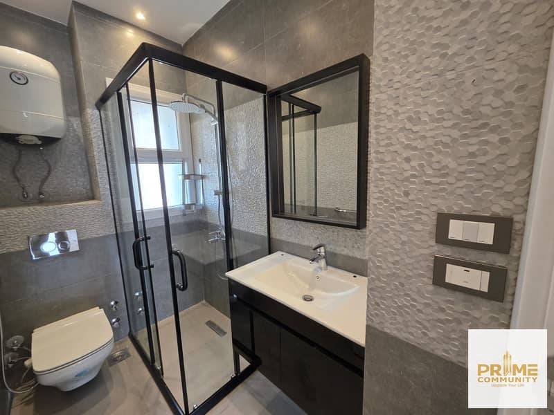 An exceptional deal: a townhouse in the "Kayan" compound—located within the "Grand Heights" complex—featuring installed kitchen cabinetry and air cond - Widok 6