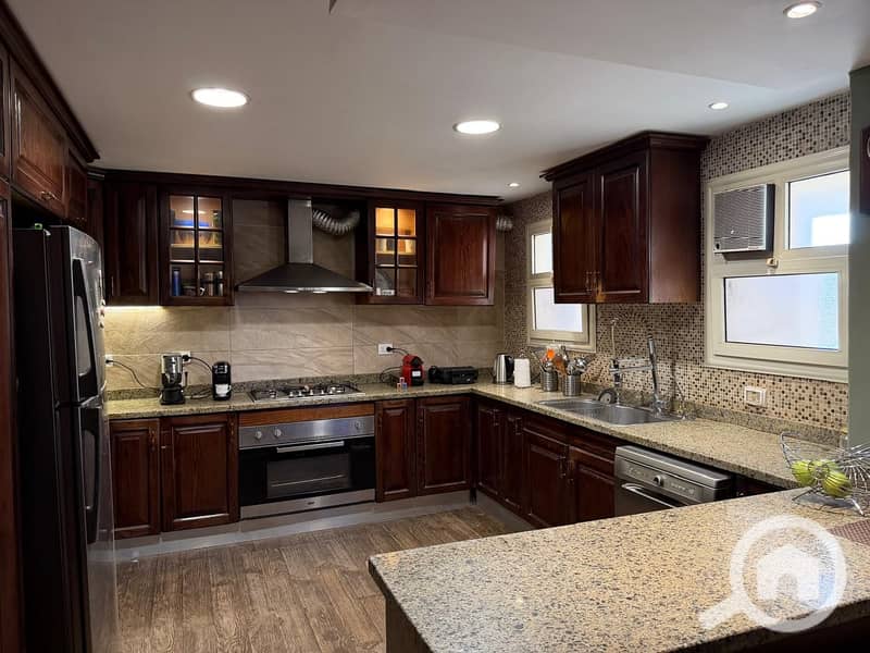 Apartment for sale in the Fourth Tourist District in front of Mall of Arabia, with a connection to Dahshur, including the kitchen. - Widok 3