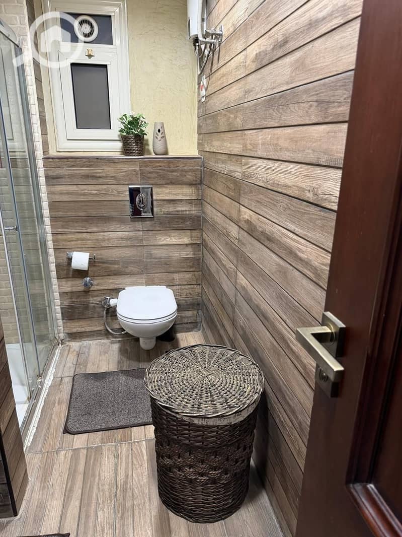 Apartment for sale in the Fourth Tourist District in front of Mall of Arabia, with a connection to Dahshur, including the kitchen. - Widok 6