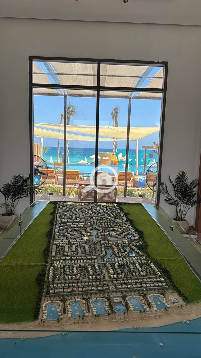 “Great opportunity! Distinctive corner ground-floor 2-bedroom chalet for sale in Ras El Hekma, North Coast, featuring a spacious 217 sqm private garde - Mehr