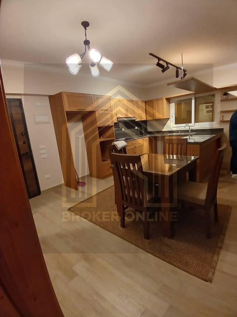 For rent, an apartment with a kitchen and air conditioning, ground floor with a garden in Hadayek October [Italian Quarter Compound] – další