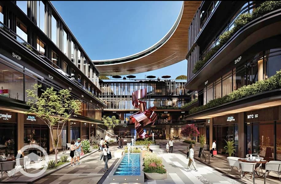 Commercial Shop For Sale in the First International District with an area of 45 meters with a 10% down payment and installments up to 5 years in the heart of October Gardens at Connect 4 Mall - Ansicht 2