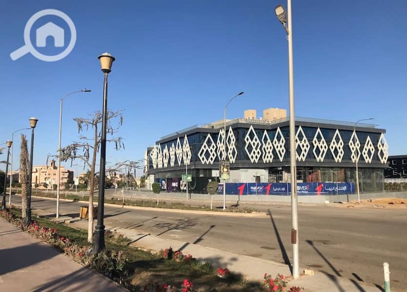 Commercial shop for rent:122sqm indoor and 76sqm outdoor- Lowest price per square meter in the area- Located directly across from Mall of Arab - Mehr