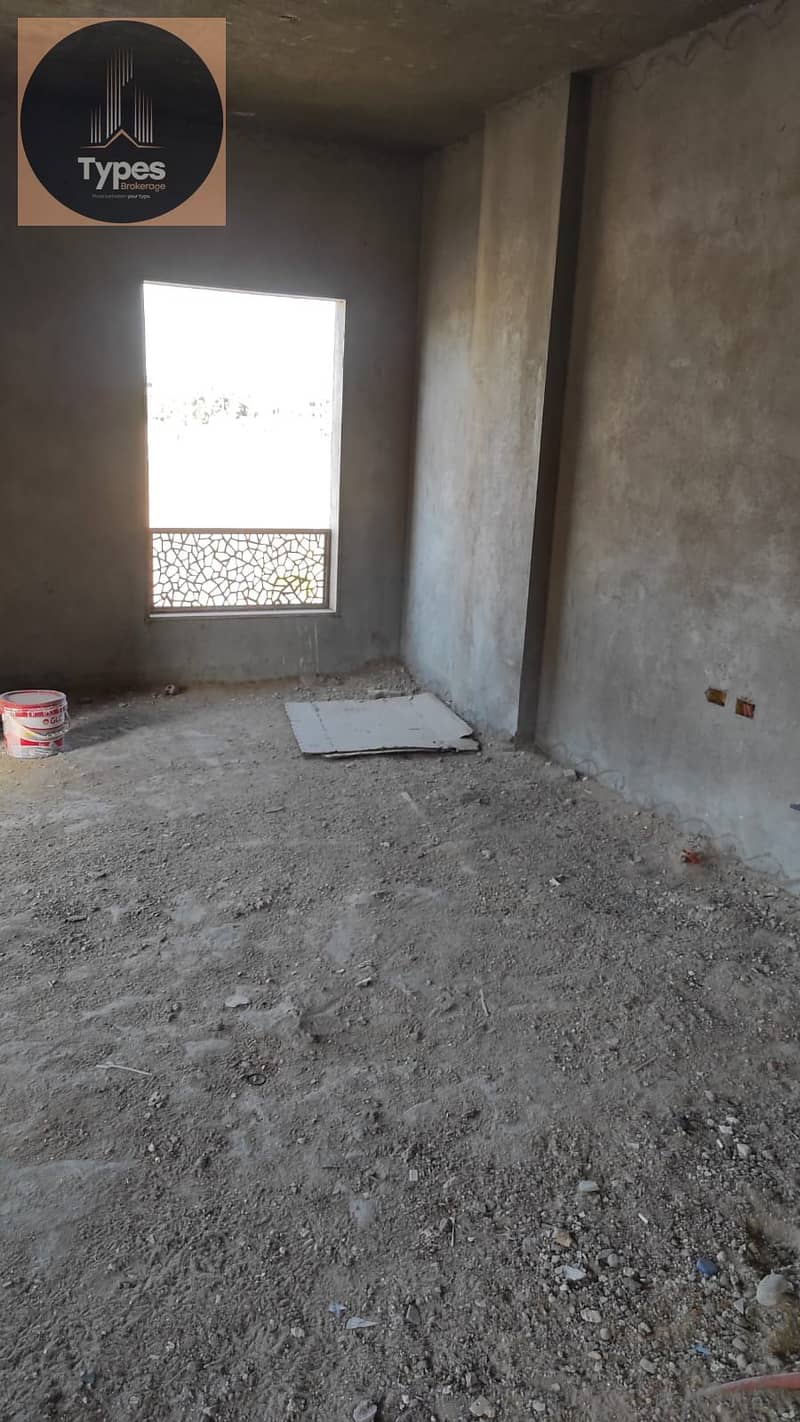 For sale: 160 sqm apartment in the First North Tourist District, behind Mall of Arabia. prime location with an open view. One minute from the Dahshur - Mehr