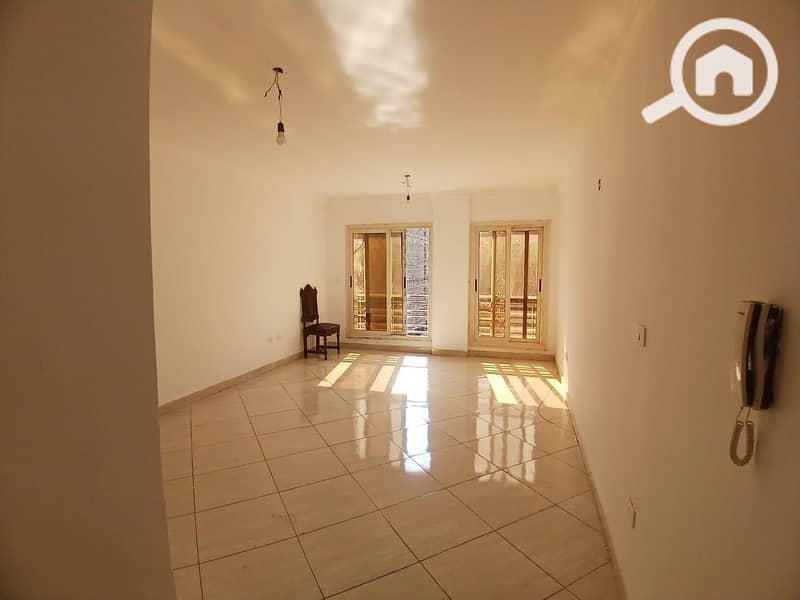 For rent in Dar Misr Al-Qaranful: a 130m² apartment on the second floor. It is located in the second building from the gate and overlooks the Jade com - Vista 2