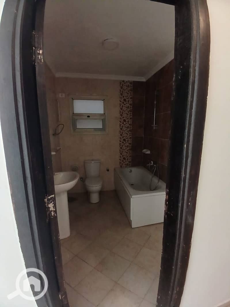 For rent in Dar Misr Al-Qaranful: a 130m² apartment on the second floor. It is located in the second building from the gate and overlooks the Jade com - Vista 4