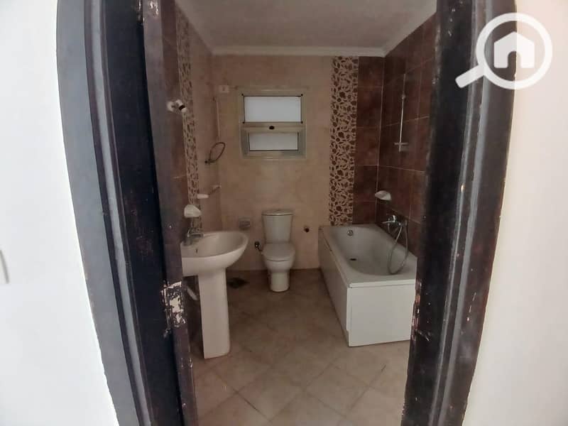 For rent in Dar Misr Al-Qaranful: a 130m² apartment on the second floor. It is located in the second building from the gate and overlooks the Jade com - Altro