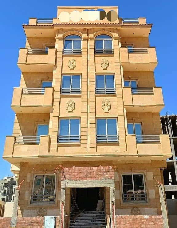 A garden view apartment with a corner hallway on the second floor, immediate delivery in Al-Nargis Al-Jadida. - Ansicht 2