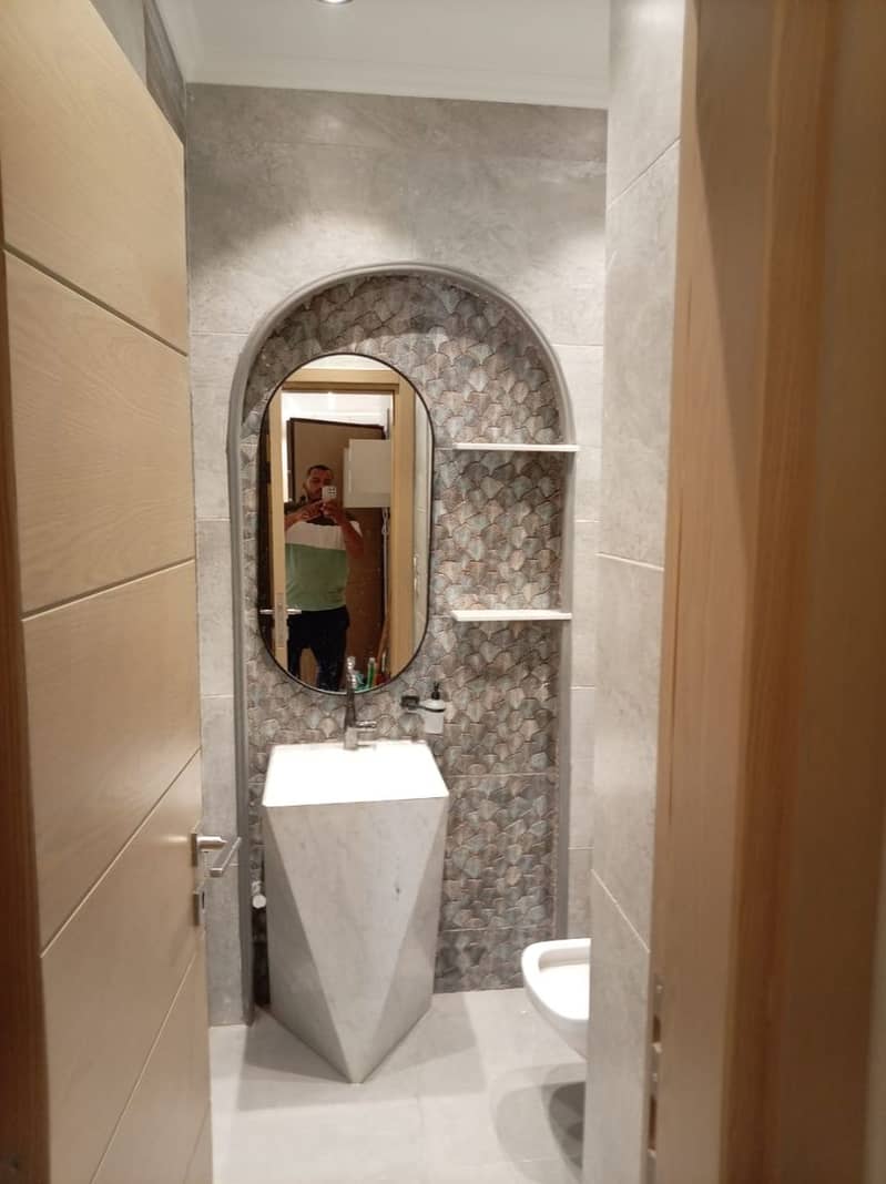 First-time rental: Ultra-modern apartment with a kitchen in the Zayed Heights compound, Sheikh Zayed prime location. - Widok 3