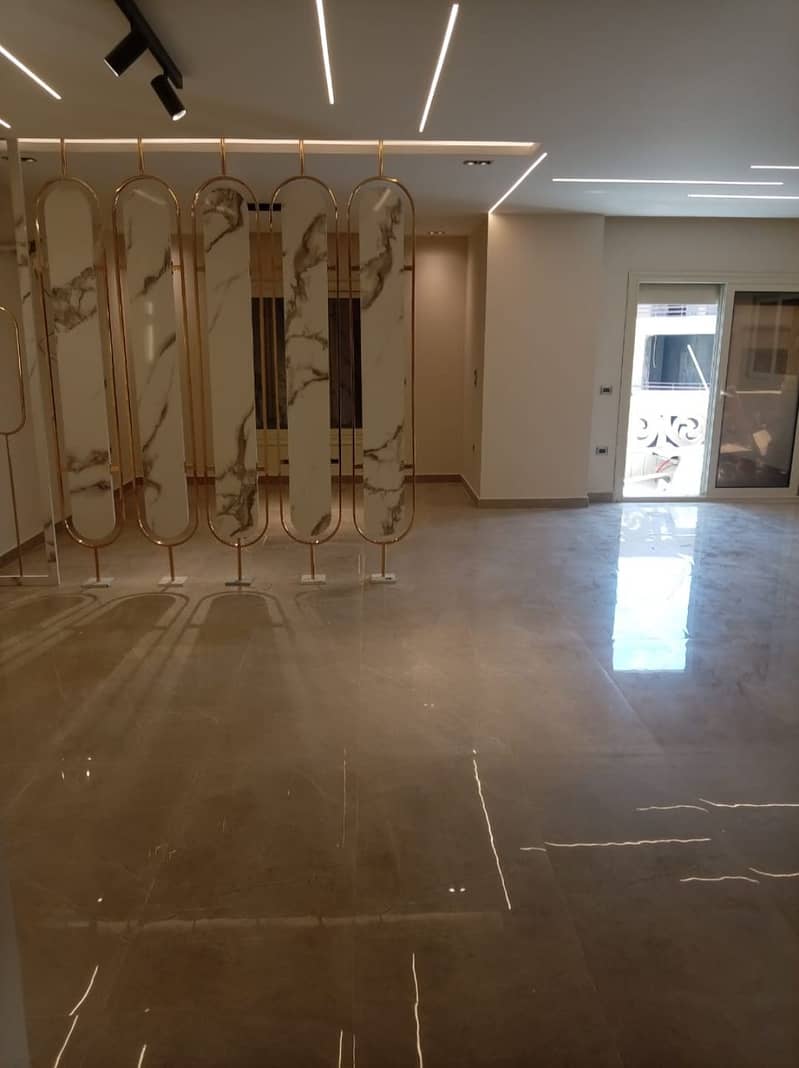 First-time rental: Ultra-modern apartment with a kitchen in the Zayed Heights compound, Sheikh Zayed prime location. - Widok 6