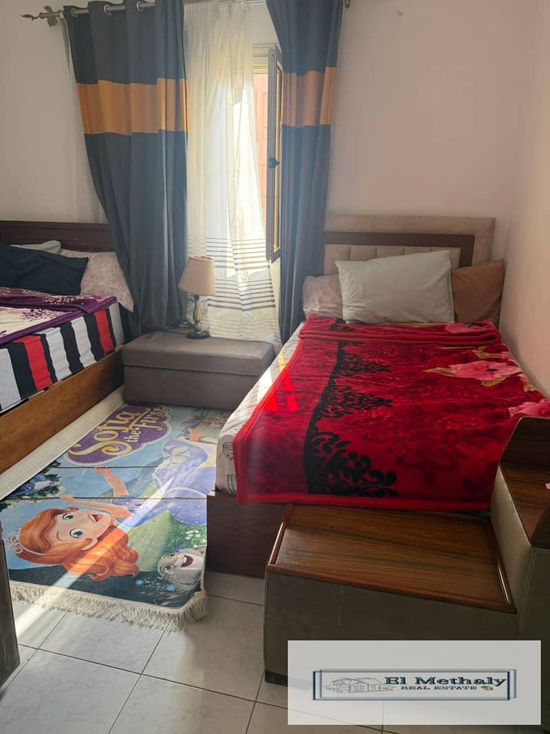 Freehold apartment for sale in Al Rehab City, New Cairo; features a wide garden view and custom, high-end finishes throughout. - Bild 5