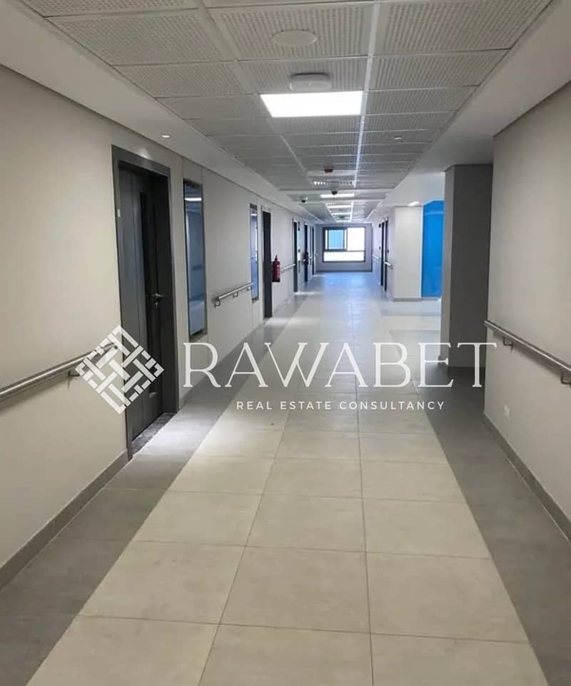 Clinic for Rent 80 m– Below Market Price | Midtown New Giza Fully finished clinic with air conditioning, offered at a price below market value. - Widok 5