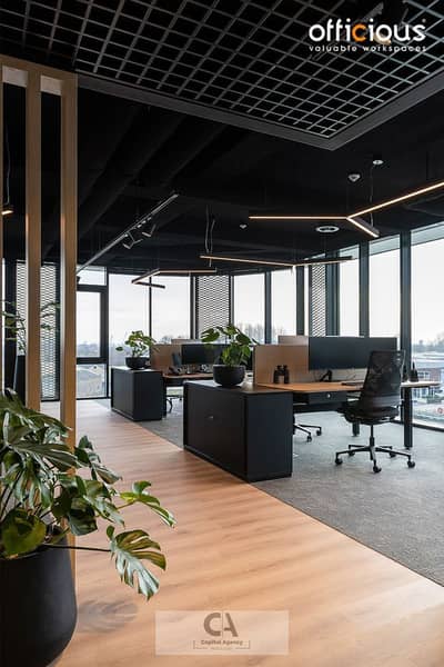 Office for Rent in New Cairo, Cairo - Groen en sfeervol kantoor met stijlvolle werkplek en verlichting. jpeg Office for Rent in New Cairo, Cairo - Groen en sfeervol kantoor met stijlvolle werkplek en verlichting. jpeg