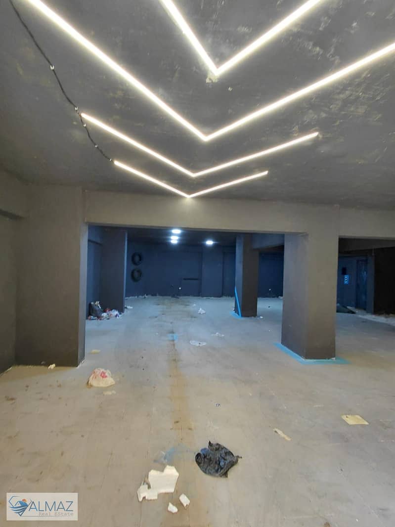 Empty basement of 160 square meters for administrative rent in the South Investors area of New Cairo, located near the American University in Cairo. - Widok 2