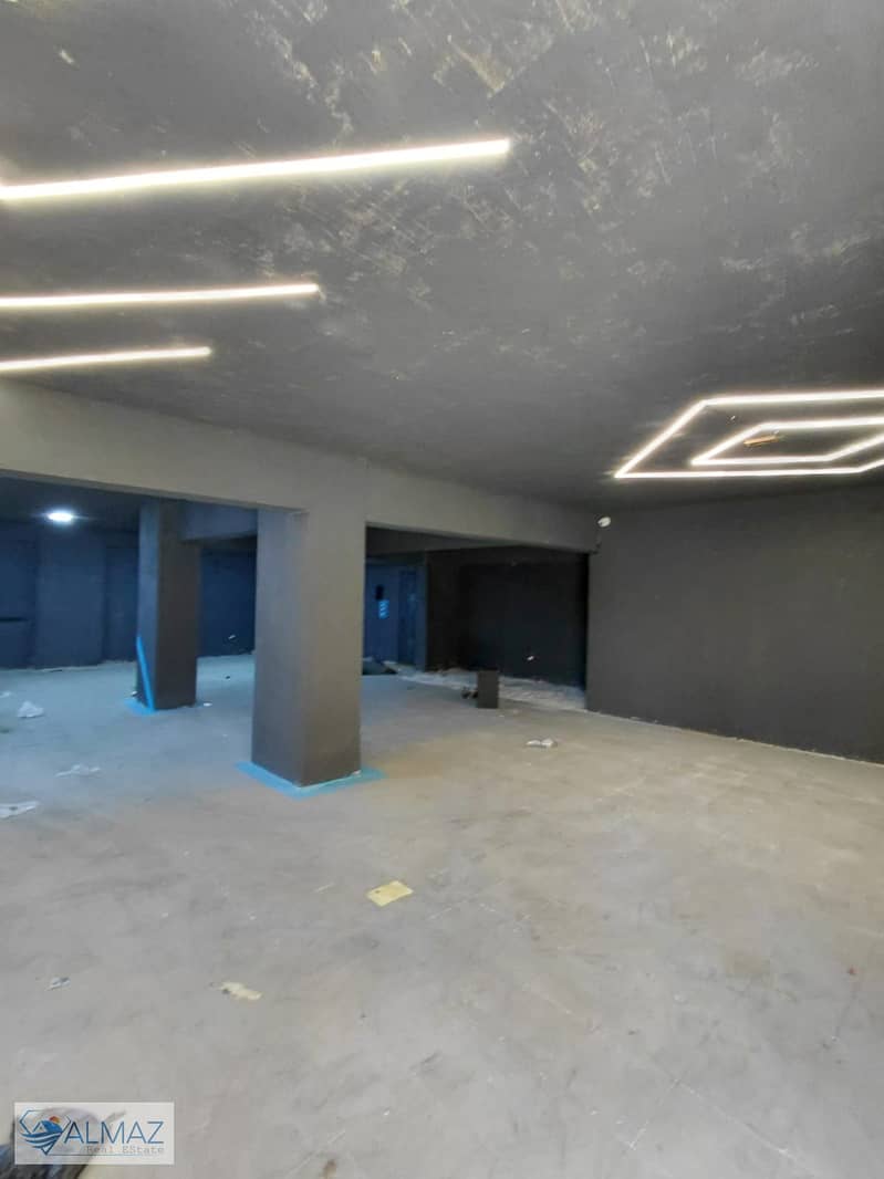 Empty basement of 160 square meters for administrative rent in the South Investors area of New Cairo, located near the American University in Cairo. - Widok 5