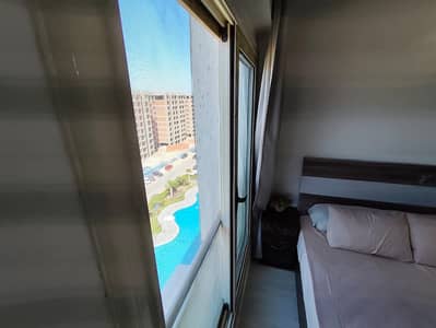 1 Bedroom Chalet for Rent in North Coast, Matruh - غرفة فندقية فاخرة للعرسان بجولف بورتو مارينا - إطلالة بحرية وتجهيز متك 1 Bedroom Chalet for Rent in North Coast, Matruh - غرفة فندقية فاخرة للعرسان بجولف بورتو مارينا - إطلالة بحرية وتجهيز متك
