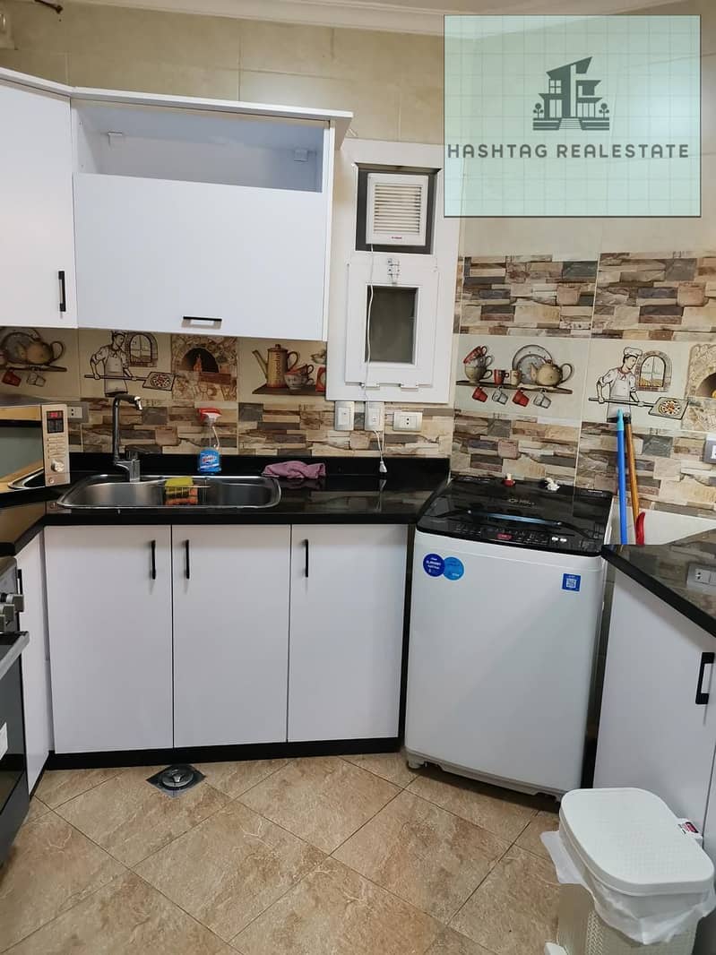 For sale, the best apartment in the Zayed Dunes compound, ground floor with a garden, 147 sqm, 3 bedrooms, 2 bathrooms, and a two-piece reception, fully furnished with appliances and air conditioning, and the garden has trees. - Mehr