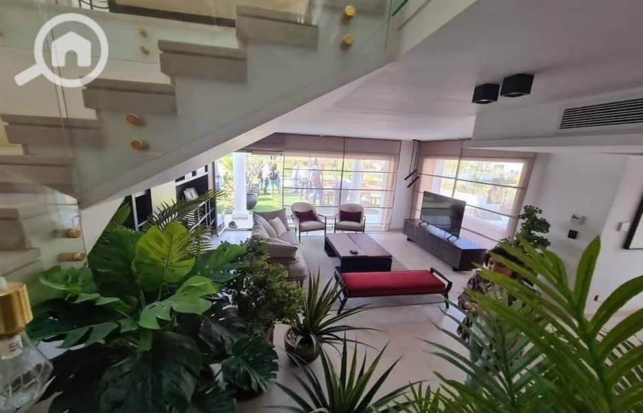 Villa for sale in SODIC East Compound, featuring a prime location just minutes away from Madinaty and the Fifth Settlement - Meer