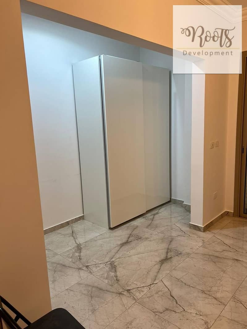 For Sale Ground Apartment With Garden,Fully Furnished ,at AEON , 6th October - Aanzicht 4