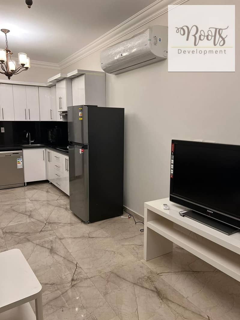For Sale Ground Apartment With Garden,Fully Furnished ,at AEON , 6th October - Aanzicht 5