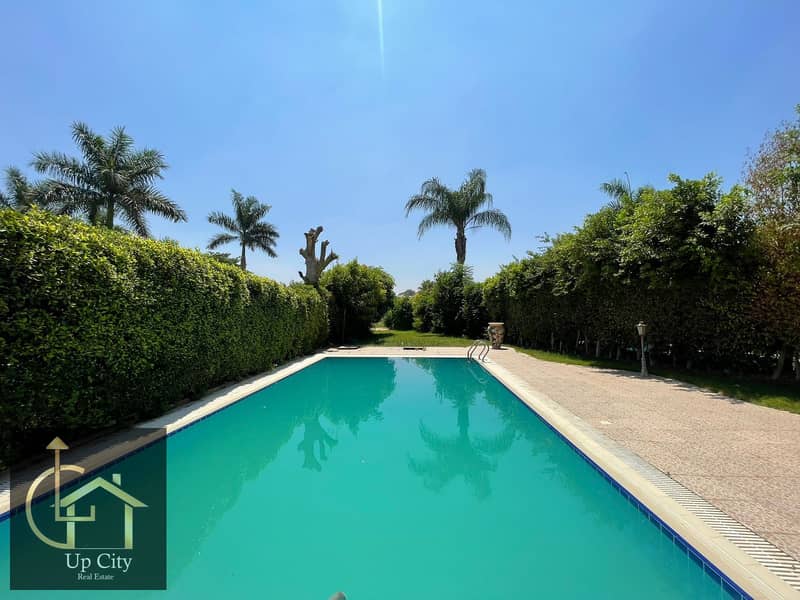 5 bedroom villa for sale in mirage city new cairo open view on landscape and private swimming pool - Vista 6