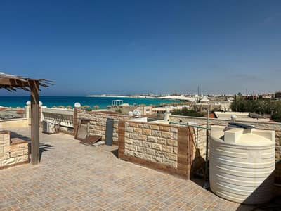 6 Bedroom Villa for Sale in North Coast, Matruh - فيلا على البحر بقرية فرح 2 بجوار مراسى