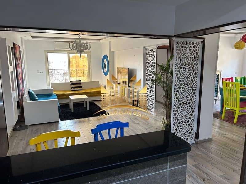 Apartment for rent in Baron City Compound, Maadi Ring Road, next to Sama Cairo Tower, area 125 m, high luxury finishing, 11th floor, 2 bedrooms, 2 bathrooms, big reception, American bar kitchen, and side living room. – další