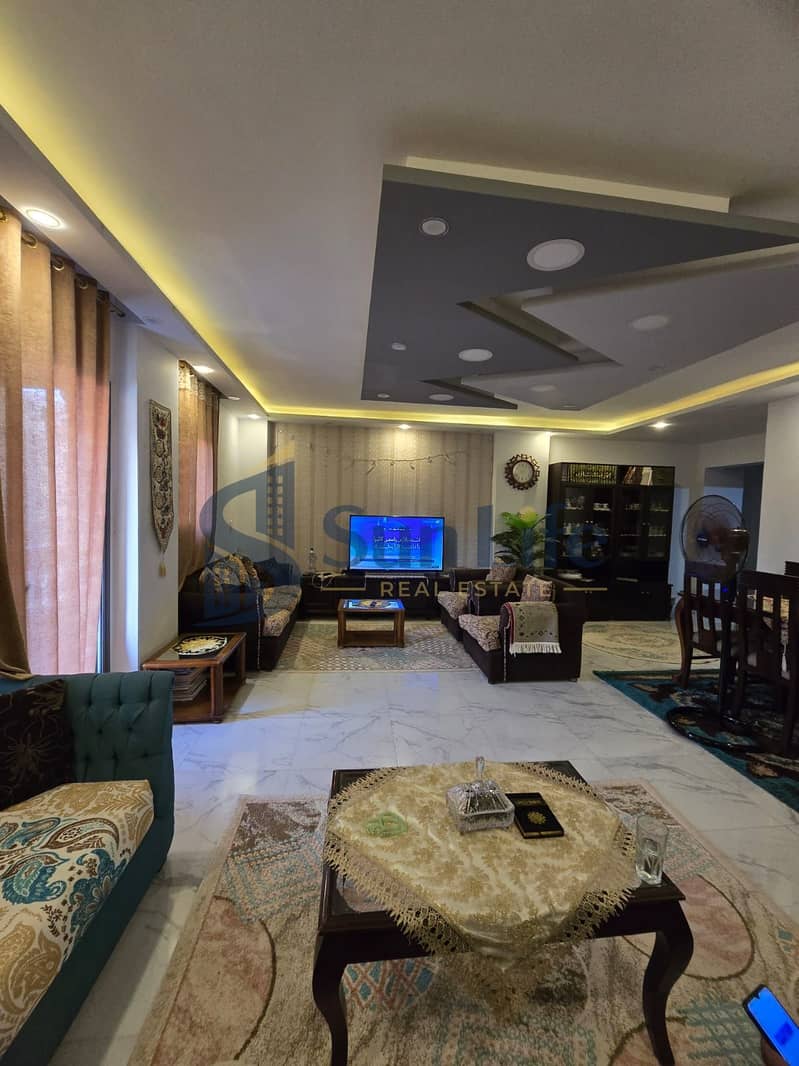 A bargain apartment for sale, finished with a northern view and an open view in Al-Firdaws City, in the investment area, in front of Dream Land and next to Al-Ashgar neighborhood, 6th of October. - Widok 2