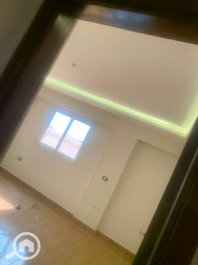 Room for rent with kitchen and heater in Al-Banasij 9, First Assembly, a very special location with a garden view. – pohled 5
