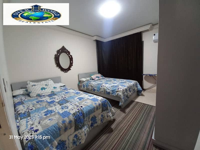 Dar Alna Trees Compound, Zahraa Al-Maadi furnished apartment for rent consists of two bedrooms, a reception, 2 bathrooms, and an air-conditioned kitchen with Wi-Fi and natural gas next to Carrefour City Center, Maadi Ring Road. - Widok 2