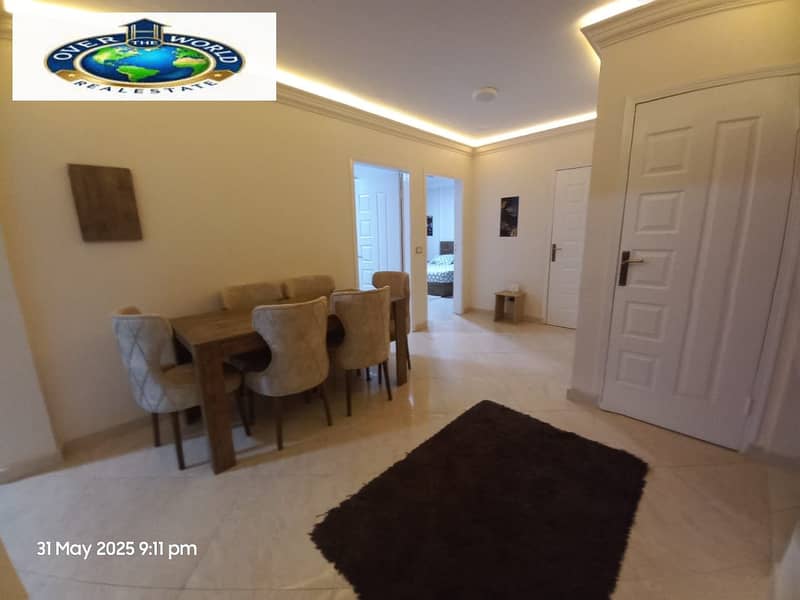 Dar Alna Trees Compound, Zahraa Al-Maadi furnished apartment for rent consists of two bedrooms, a reception, 2 bathrooms, and an air-conditioned kitchen with Wi-Fi and natural gas next to Carrefour City Center, Maadi Ring Road. - Więcej