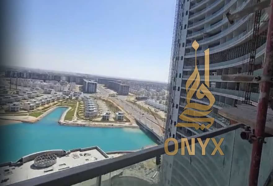 Apartment 121 sqm Resale for Sale, Ready to Move on a High Floor with Direct Lagoon View & Side Sea View in The Gate Towers, Alamein - Bild 3