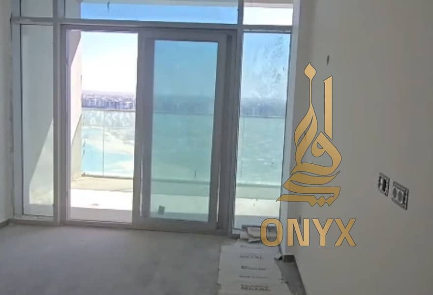 Apartment 121 sqm Resale for Sale, Ready to Move on a High Floor with Direct Lagoon View & Side Sea View in The Gate Towers, Alamein - Fler