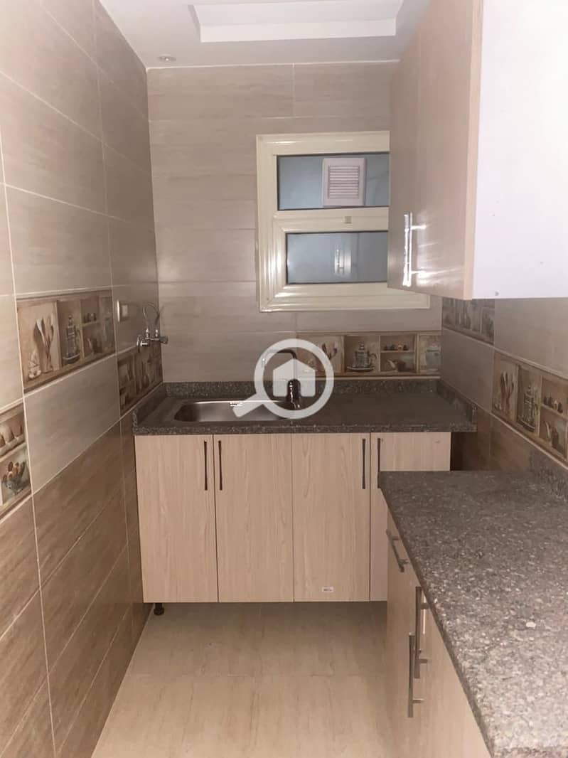 Licensed office space for rent 200m on Mustafa El-Nahhas main street, with air conditioning in a modern office tower. - Aanzicht 6