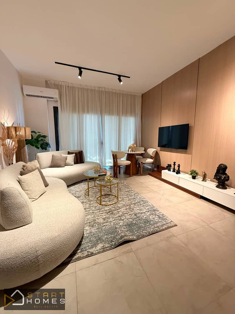 Fully furnished 100-square-meter, two-bedroom apartment for rent in Privado, Madinaty; features custom finishes and brand-new furniture and appliances - Aanzicht 3