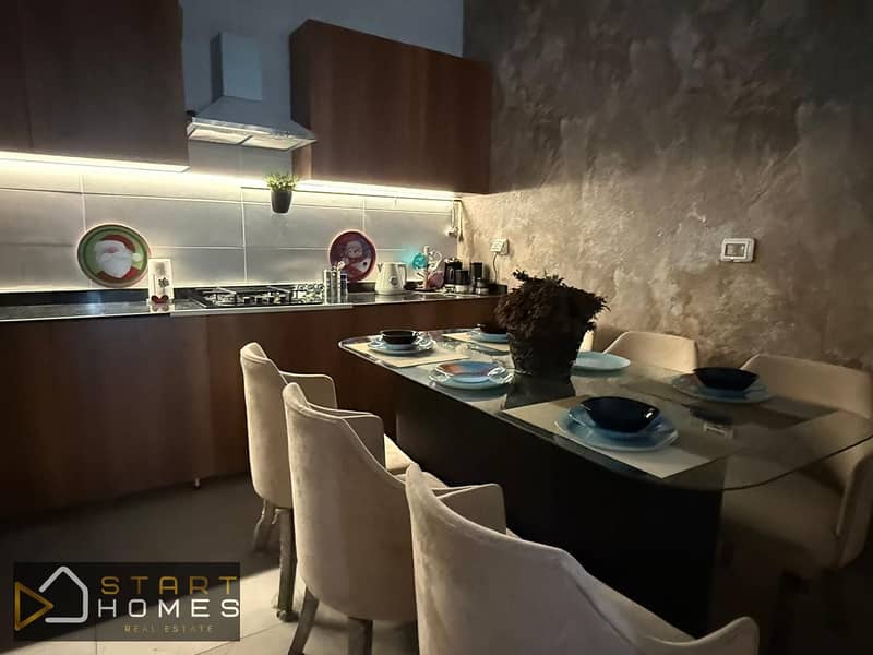 Fully furnished 100-square-meter, two-bedroom apartment for rent in Privado, Madinaty; features custom finishes and brand-new furniture and appliances - Aanzicht 5