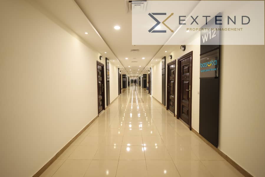 Office for rent with a net area of 97 sqm in 6th of October on the central axis - Vista 2